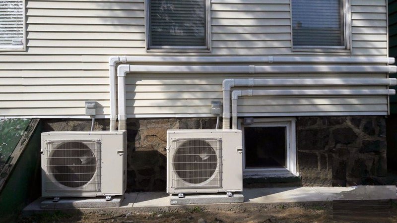 Ductless heat pump units on the wall after the installation is done: call us for cost details